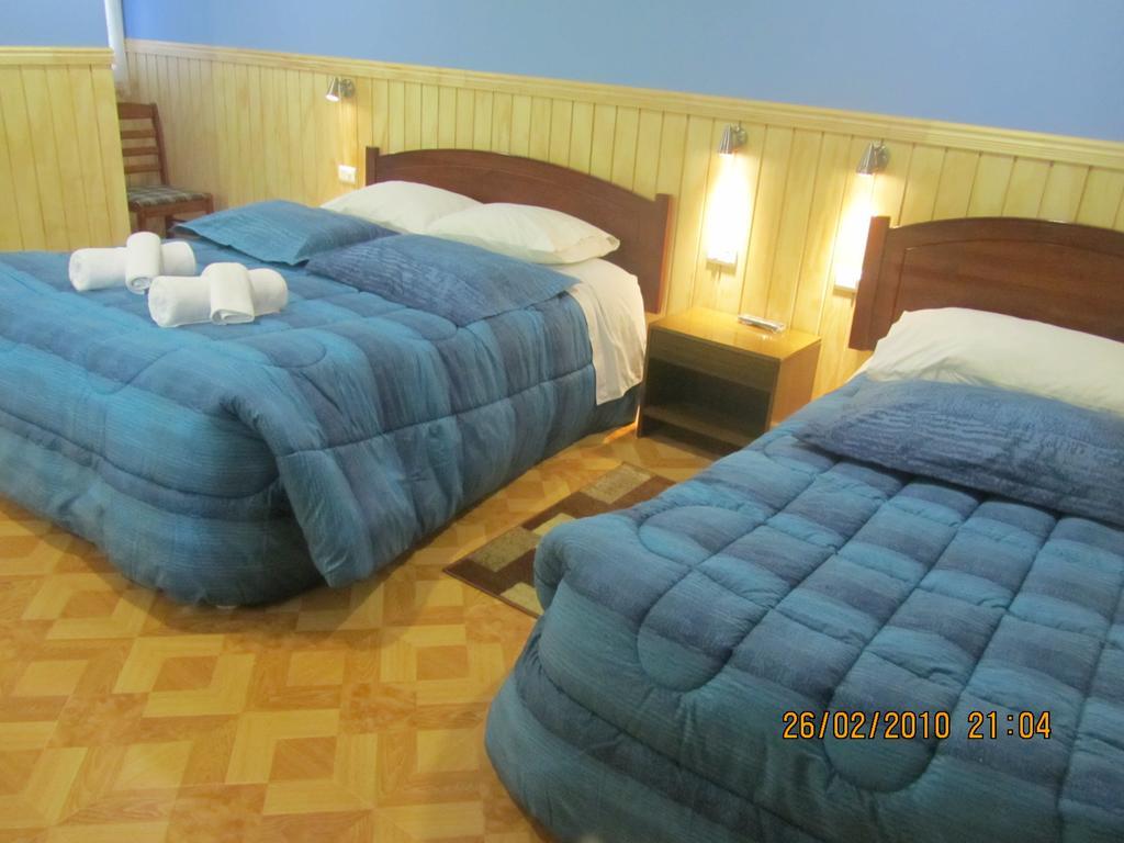 Patagonia Swiss House Hotel Пуерто Наталес Екстериор снимка